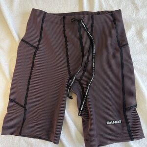 Bandit Running STRIPED CADENCE™ 7-Pocket Half Tights – Black/Mauve